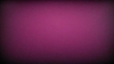 The primary subject of the image is a large, pink wall. The setting is a room with a pink background, and the visual style is a close-up of the wall. The dominant colors are pink, and the overall atmosphere is warm and inviting.