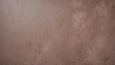 The primary subject of the image is a brown leather wall, which is the main focus of the scene. The setting is a room with a brown leather wall, and the visual style is a close-up of the wall. The colors and mood of the image are warm and earthy, with the brown leather wall being the dominant color.