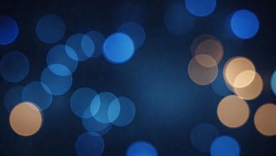 The primary subject of the image is a blue background with a pattern of blue lights. The setting appears to be a dark room, and the visual style is a digital art or illustration. The dominant colors are blue, and the overall atmosphere is calm and serene.