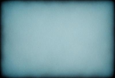 The primary subject of the image is a large, empty blue space. The setting is a blue background, which creates a sense of depth and contrast. The visual style is a simple, clean design, with no intricate details or patterns. The colors and mood of the image are predominantly blue, which can evoke feelings of calmness or tranquility.