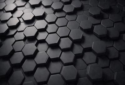 The primary subject of the image is a black and white patterned surface, which appears to be a tile or a black and white checkered pattern. The setting is a dark room, and the visual style is a close-up of the pattern. The colors and mood of the image are predominantly black and white, giving it a classic and timeless appearance.
