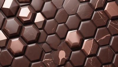 The primary subject of the image is a close-up of a marbled chocolate surface. The setting is a patterned marble wall, which adds a unique and visually appealing backdrop to the scene. The visual style is a close-up of the marbled chocolate, showcasing its intricate patterns and textures. The colors and mood of the image are predominantly brown, with the marbled chocolate and the marble wall creating a warm and inviting atmosphere.