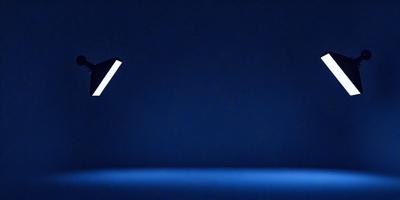 The primary subject of the image is a book, which is lit up and appears to be floating in the air. The setting is a dark blue background, which creates a dramatic and moody atmosphere. The visual style is a combination of photo and digital art, giving the image a unique and artistic appearance. The colors and mood of the image are predominantly dark and mysterious, with the lit-up book serving as a focal point and source of interest.