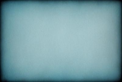 The primary subject of the image is a blue background with a white paper. The setting is a white paper with a blue background, creating a contrasting color scheme. The visual style is a simple, clean design with a focus on the paper and its color. The colors and mood of the image are predominantly blue and white, giving it a calm and serene atmosphere.