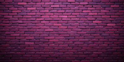 The primary subject of the image is a brick wall, which is the main object, scene, or focus of the image. The setting/background consists of a purple brick wall, which is the visible environment, backdrop, or surface. The visual style of the image is a photo, as it is a real-life brick wall. The colors and mood of the image are predominantly purple, giving it a unique and distinctive appearance.