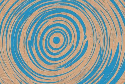 The primary subject of the image is a blue circle with a white center, which appears to be a painting or drawing. The setting is a wooden surface, possibly a table or a wall, with the blue circle as the main focus. The visual style suggests that the image is a creative artwork, possibly a painting or a digital art piece. The dominant colors are blue and white, creating a calm and serene atmosphere.