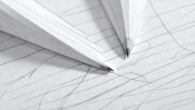 The primary subject of the image is a pencil, which is placed on a piece of paper. The setting is a drawing or sketch, with the pencil being the main focus. The visual style appears to be a combination of drawing and digital art, as the pencil is placed on a piece of paper, which is a traditional medium for drawing, while the paper itself is a modern, digital medium. The colors and mood of the image are predominantly neutral, with the pencil being the main source of contrast