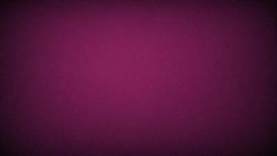 The primary subject of the image is a purple wall. The setting is a room with a purple wall, and the visual style is a close-up of the wall. The dominant colors are purple, and the overall atmosphere is calm and serene.