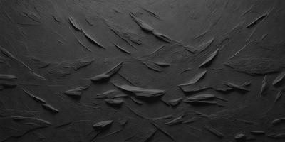 The primary subject of the image is a black background with a pattern of thin, curved lines. The setting appears to be a dark room, and the visual style is a combination of a photo and a drawing. The colors in the image are predominantly black, and the overall atmosphere is somewhat mysterious and intriguing.