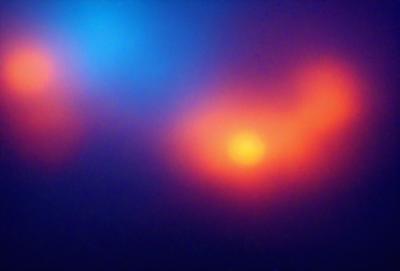The primary subject of the image is a brightly colored, swirling pattern that resembles a kaleidoscope. The setting is a dark blue background, which contrasts with the vibrant colors of the pattern. The visual style appears to be a digital art or illustration, as the colors and patterns are intricately detailed. The overall atmosphere is lively and dynamic, with the swirling pattern capturing the viewer's attention.