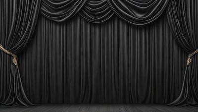 The primary subject of the image is a black curtain, which is the main object in the scene. The setting is a stage or a theater, with the curtain hanging down in front of it. The visual style of the image is a black and white photo, giving it a classic and dramatic appearance. The dominant colors are black and white, creating a moody and dramatic atmosphere.