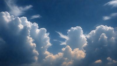 The primary subject of the image is a cloudy sky filled with various cloud formations. The setting is a blue sky, which serves as the backdrop for the clouds. The visual style of the image is a photo, capturing the beauty of the cloudy sky. The colors and mood of the image are predominantly blue and serene, with the clouds adding a sense of depth and movement to the scene.
