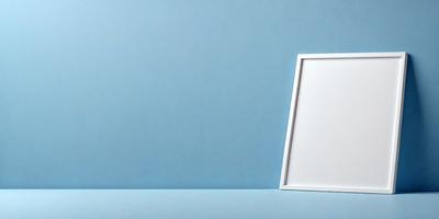 The primary subject of the image is a white picture frame. The setting is a blue wall, which serves as the backdrop for the picture frame. The visual style is a photo, and the colors and mood are predominantly blue, creating a calm and serene atmosphere.