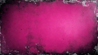 The primary subject of the image is a pink background. The setting is a pink wall, and the visual style is a photo. The colors and mood of the image are predominantly pink, creating a warm and vibrant atmosphere.