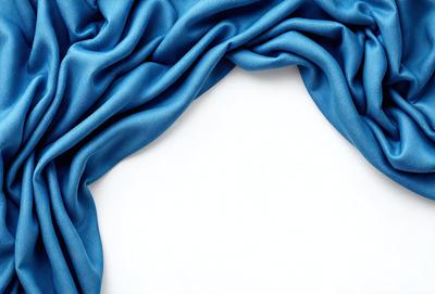 The primary subject of the image is a blue curtain. The curtain is hanging down, covering a white background. The visual style of the image is a photo, and the colors and mood are predominantly blue, creating a calm and serene atmosphere.