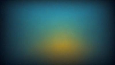 The primary subject of the image is a sunset, with the sun setting behind a blue sky. The setting is a vast, open space, and the visual style is a photo. The colors and mood of the image are warm and serene, with the sun's rays creating a beautiful, golden glow in the sky.