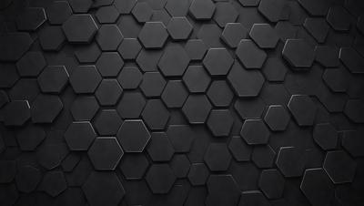 The primary subject of the image is a black and white patterned surface, which appears to be a black tile or a black and white checkered pattern. The setting is a black background, which contrasts with the patterned surface. The visual style is a close-up of the patterned surface, showcasing the intricate details of the design. The colors and mood of the image are predominantly black and white, giving it a classic and timeless appearance.