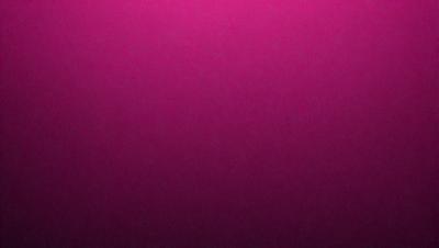 The primary subject of the image is a close-up of a pink background. The setting is a wall, and the visual style is a photo. The dominant colors are pink, and the overall atmosphere is warm and inviting.