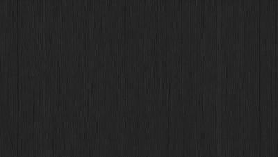 The primary subject of the image is a black wall with a wooden texture. The setting is a room with a black background, and the visual style is a close-up of the wooden wall. The colors and mood of the image are predominantly dark and moody, with the black wall and wooden texture creating a dramatic and intense atmosphere.