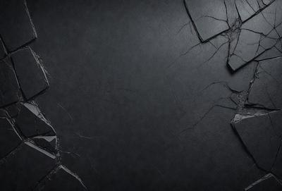 The primary subject of the image is a black leather surface with a cracked appearance. The setting is a dark room, and the visual style is a close-up of the leather surface. The colors and mood of the image are dark and moody, with the black leather and cracked appearance creating a sense of unease or tension.