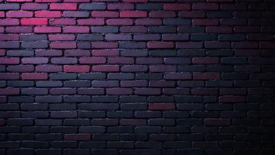 The primary subject of the image is a brick wall. The setting is a dark room, and the visual style appears to be a photo. The dominant colors in the image are red and black, creating a moody atmosphere.
