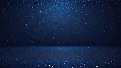 The primary subject of the image is a blue background with a pattern of white stars. The setting is a dark room, and the visual style appears to be a digital art or illustration. The dominant colors are blue and white, creating a calm and serene atmosphere.