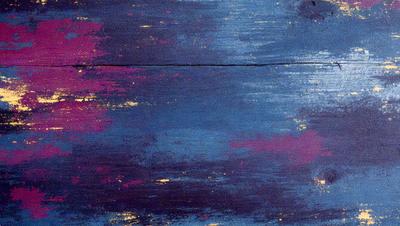 The primary subject of the image is a wooden surface with a blue and purple color scheme. The setting is a cloudy sky, which serves as the backdrop for the wooden surface. The visual style of the image is a combination of a photo and digital art, creating a unique and artistic representation of the scene. The dominant colors in the image are blue and purple, giving it a calming and serene atmosphere.