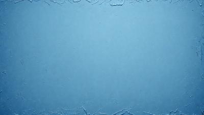 The primary subject of the image is a blue background with a white texture. The setting is a blue wall, and the visual style is a close-up of the blue wall. The colors and mood of the image are predominantly blue and white, creating a calm and serene atmosphere.