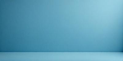 The primary subject of the image is a blue wall. The setting is a room with a blue background. The visual style is a photo, and the colors and mood are predominantly blue, creating a calm and serene atmosphere.