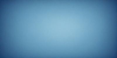 The primary subject of the image is a large, empty blue sky. The setting is a vast, open space with no visible landmarks or objects. The visual style is a simple, clean blue background, which gives the image a calm and serene atmosphere.