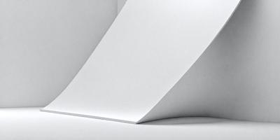 The primary subject of the image is a white piece of paper. The setting is a white background, which creates a clean and minimalist appearance. The visual style is a close-up of the paper, emphasizing its texture and details. The colors and mood of the image are predominantly white, giving it a calm and serene atmosphere.
