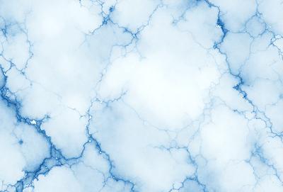 The primary subject of the image is a blue and white cloudy sky. The setting is a blue background, and the visual style is a photo. The colors and mood of the image are predominantly blue and white, creating a serene and calming atmosphere.