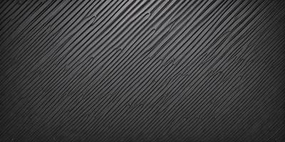 The primary subject of the image is a black and white pattern, which appears to be a close-up of a wall. The setting is a black background, and the visual style is a pattern or texture. The dominant colors are black and white, and the overall atmosphere is somewhat moody or dramatic.