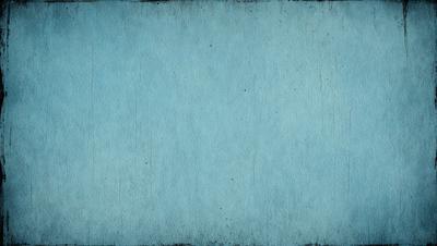 The primary subject of the image is a blue wall with a textured surface. The setting is a room with a blue wall, and the visual style is a photo. The dominant colors are blue and white, creating a calm and serene atmosphere.