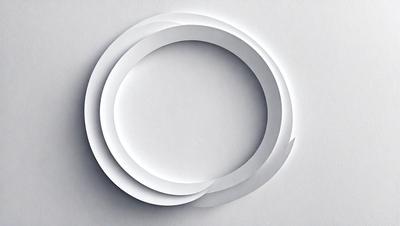 The primary subject of the image is a white circle, which is the main object, scene, or focus of the image. The setting is a white background, and the visual style is a photo. The colors and mood of the image are predominantly white, giving it a clean and minimalist appearance.