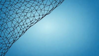 The primary subject of the image is a close-up of a fishing net, with a blue background. The visual style appears to be a photo, and the colors and mood are predominantly blue, creating a calm and serene atmosphere.