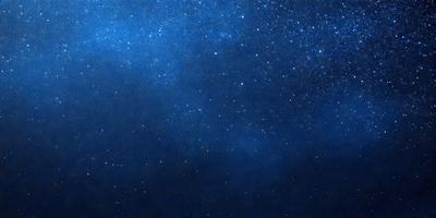The primary subject of the image is the night sky, which is filled with stars. The setting is a dark, star-filled sky, and the visual style is a digital art or illustration. The colors and mood of the image are predominantly dark and serene, with the stars providing a sense of depth and beauty.