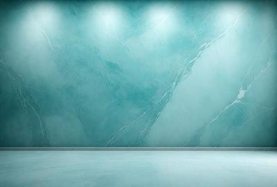 The primary subject of the image is a large, blue marble wall with a patterned texture. The setting is a room with a blue floor, and the visual style appears to be a photo. The dominant colors in the image are blue and white, creating a calm and serene atmosphere.