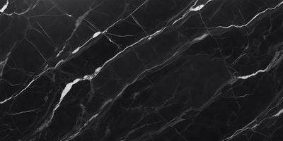 The primary subject of the image is a black marble countertop. The setting is a kitchen, with the countertop being the main focus of the scene. The visual style is a close-up of the marble countertop, showcasing its texture and pattern. The colors and mood of the image are predominantly dark, with the black marble countertop being the main source of contrast.
