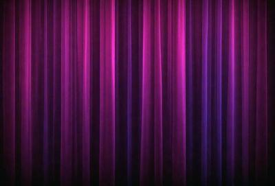 The primary subject of the image is a purple curtain. The setting is a stage or a theater, as the curtain is hanging in front of it. The visual style is a close-up of the curtain, showcasing its texture and color. The dominant colors are purple and pink, creating a warm and inviting atmosphere.