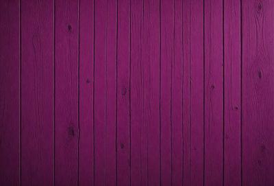 Purple wall with wooden planks.