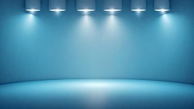 The primary subject of the image is a blue wall with three lights shining on it. The setting is a room with a blue background, and the visual style is a photo. The dominant colors are blue and white, creating a calm and serene atmosphere.