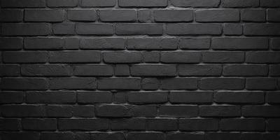 The primary subject of the image is a black brick wall. The setting is a dark room, and the visual style is a close-up of the brick wall. The colors and mood of the image are predominantly dark, with the black brick wall being the main focus.
