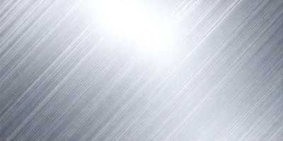 The primary subject of the image is a bright light source, which appears to be a sun or a light bulb. The light source is shining on a silver surface, creating a reflective and shiny appearance. The setting is a dark background, which contrasts with the bright light source. The visual style of the image is a combination of photo and digital art, as it captures the light source's reflection on the silver surface. The colors and mood of the image are predominantly silver and reflective, with a hint