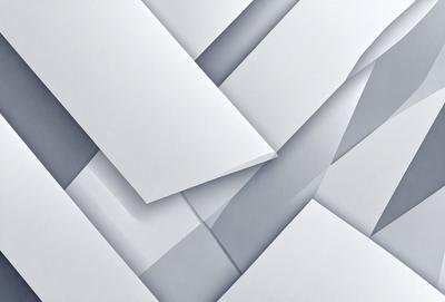 The primary subject of the image is a large stack of white paper. The setting is a white background, which creates a clean and minimalist appearance. The visual style is a close-up of the paper, showcasing its texture and details. The colors and mood of the image are predominantly white, giving it a simple and elegant feel.