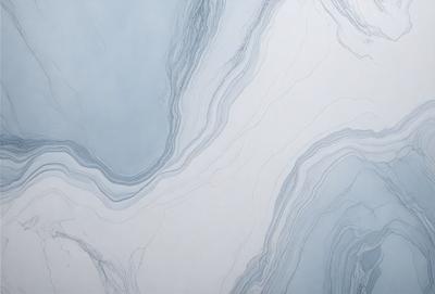 The primary subject of the image is a large, white, and blue marble wall. The setting is a room with a white background, and the visual style is a photo. The colors and mood of the image are predominantly white and blue, creating a clean and serene atmosphere.