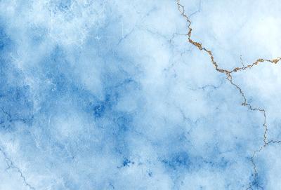 The primary subject of the image is a blue and white marble wall. The setting is a blue sky, and the visual style is a digital art or illustration. The dominant colors are blue and white, creating a calm and serene atmosphere.