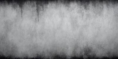 The primary subject of the image is a white wall with a gray texture. The setting is a room with a white wall, and the visual style is a grayscale image. The dominant colors are white and gray, creating a mood of simplicity and minimalism.