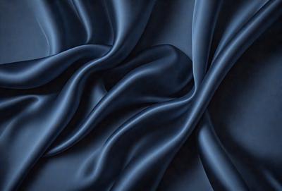 The primary subject of the image is a blue fabric, which appears to be a piece of cloth or a curtain. The setting is a dark room, and the visual style is a close-up of the fabric. The colors and mood of the image are predominantly dark and moody, with the blue fabric being the main focus.