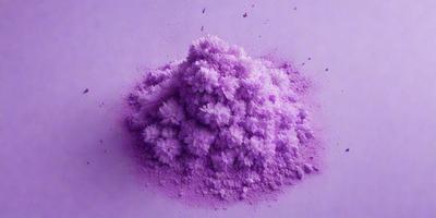 Purple powder, possibly a powdered flower, is spread out on a purple surface. The powder is in a pile, and it appears to be a close-up of the powder. The purple background and the powder's color create a visually striking scene.